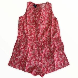 Gap- 2T- pink romper with white floral design and ruffle-like bottom